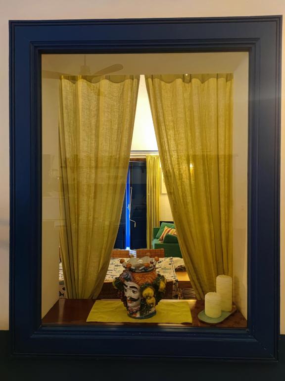 Łóżko lub łóżka w pokoju w obiekcie Casabluette a Minori - Amalfi coast