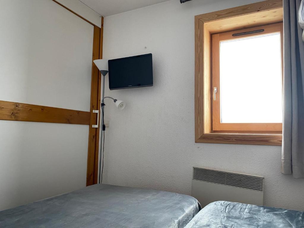 Postel nebo postele na pokoji v ubytování Le V - 2 bedrooms flat in the middle of Val Thorens
