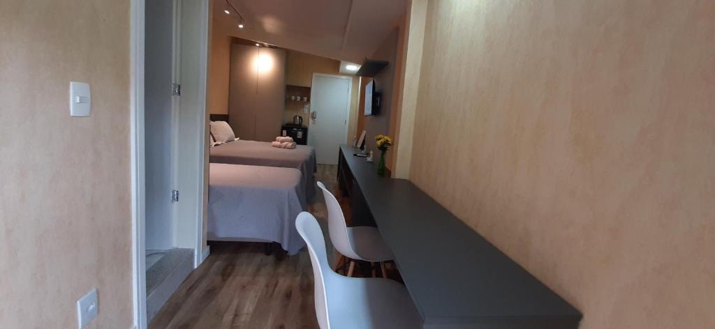 Katil atau katil-katil dalam bilik di Apartamento Mania Terceiro Andar