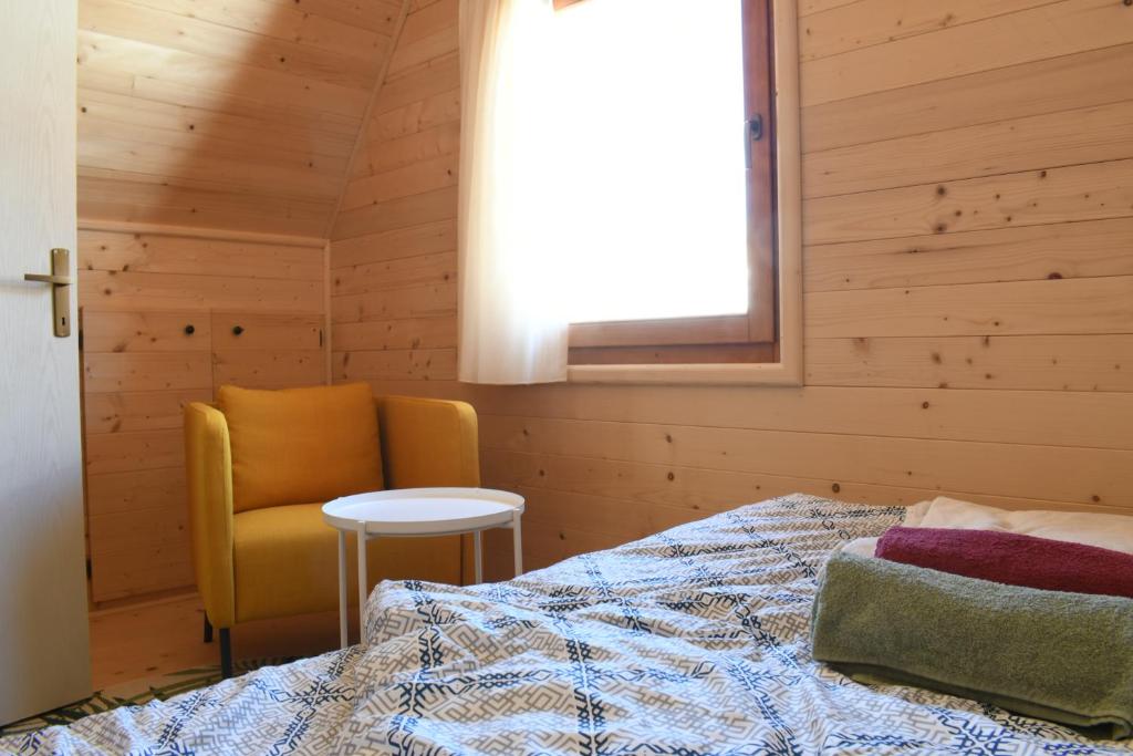 Postel nebo postele na pokoji v ubytování Koliba Vuk