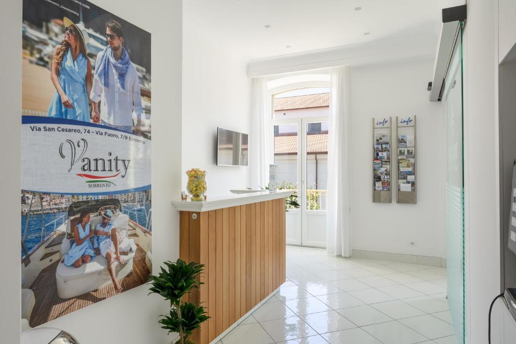 a hallway with a large movie poster on the wall at Duomo Guest House in Sorrento