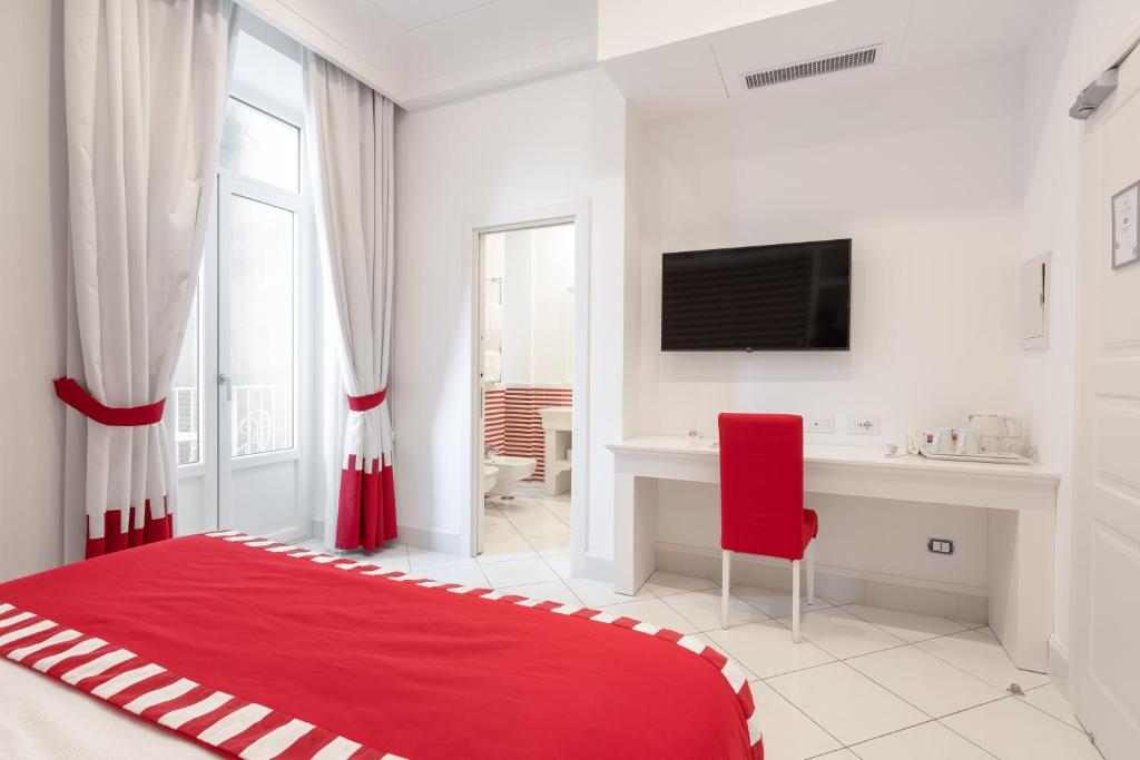 TV a/nebo společenská místnost v ubytování Duomo Guest House - Stay in Sorrento