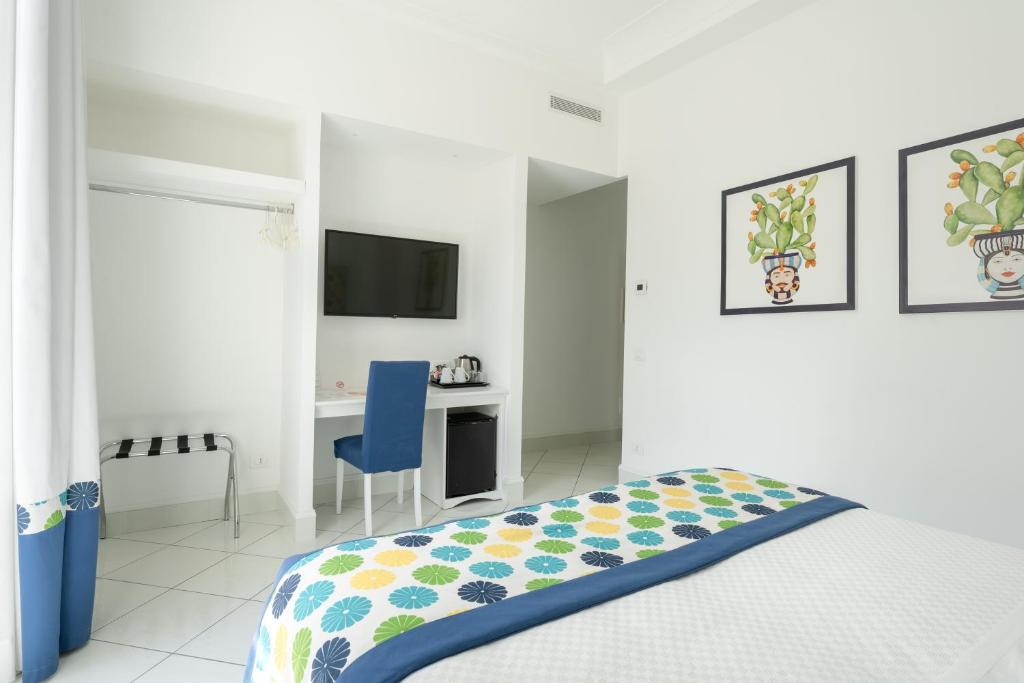 Postel nebo postele na pokoji v ubytování Duomo Guest House - Stay in Sorrento