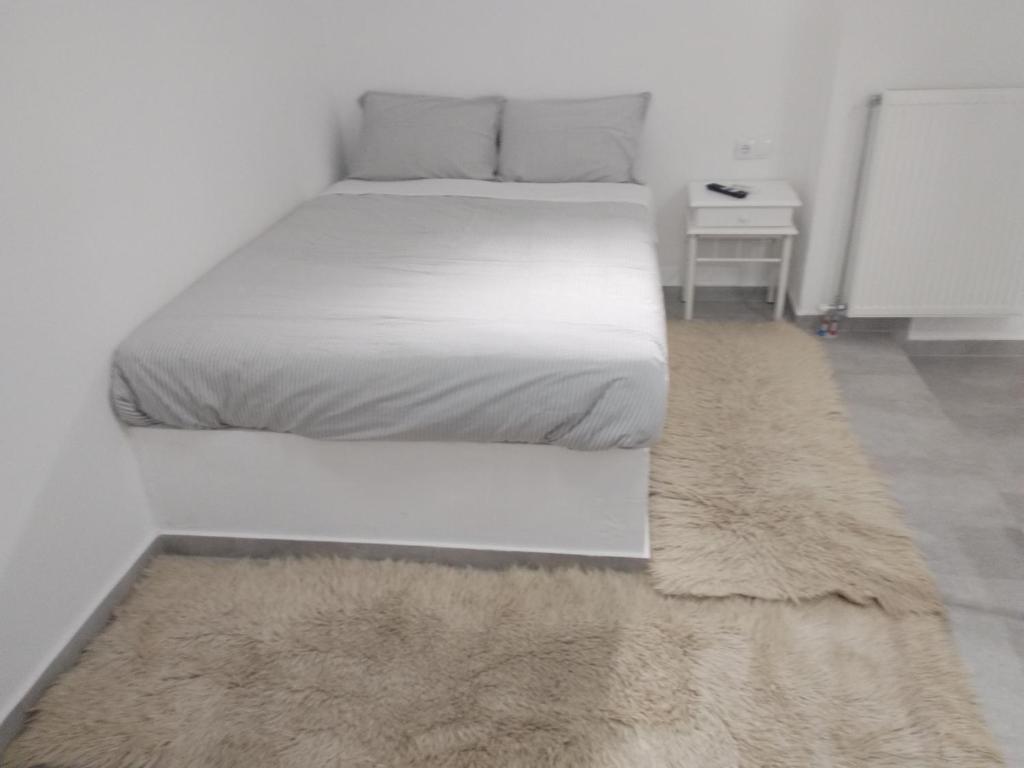 Postel nebo postele na pokoji v ubytování AFRODITE