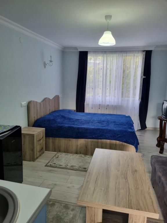 Llit o llits en una habitació de Guest House Sando