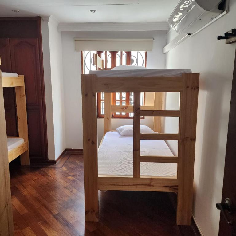 Postel nebo postele na pokoji v ubytování Paisa Hostel Medellín