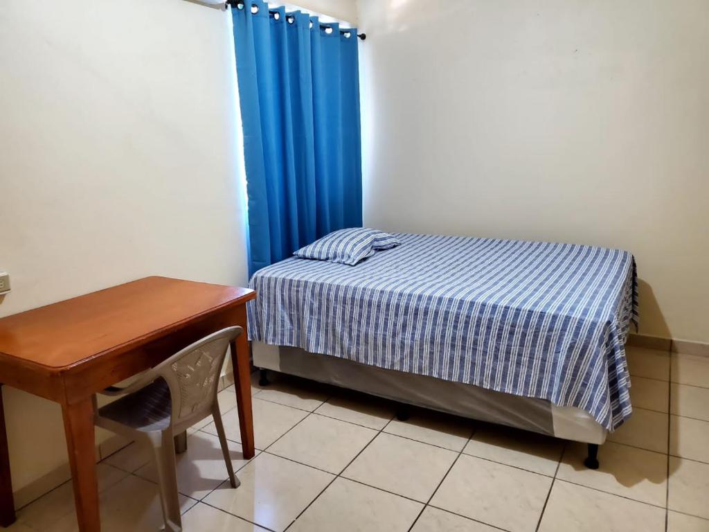 Postel nebo postele na pokoji v ubytování Hotel Caribbean Inn