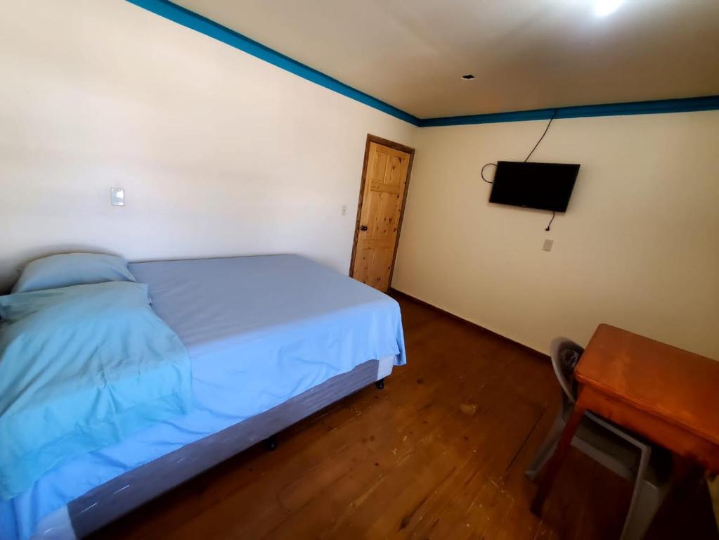 Postel nebo postele na pokoji v ubytování Hotel Caribbean Inn