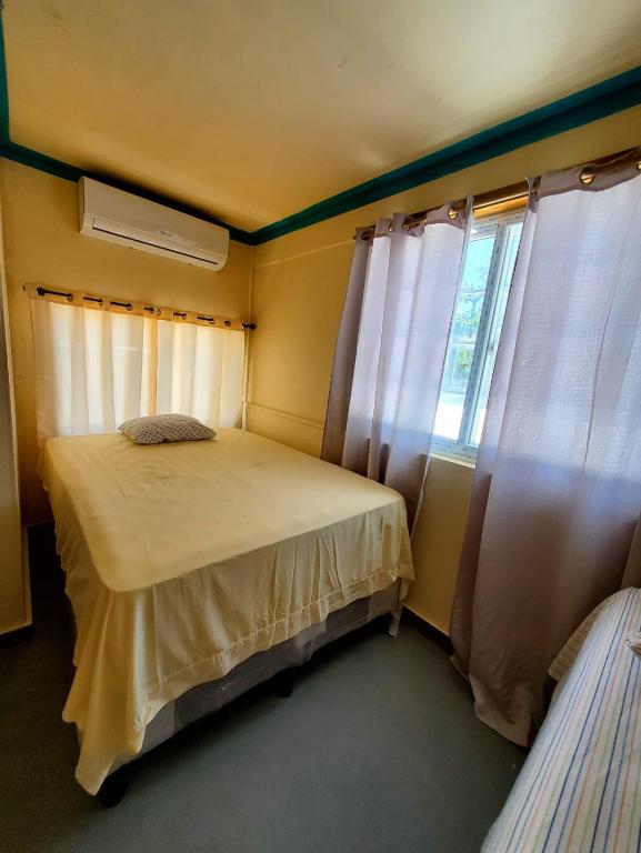 Postel nebo postele na pokoji v ubytování Hotel Caribbean Inn