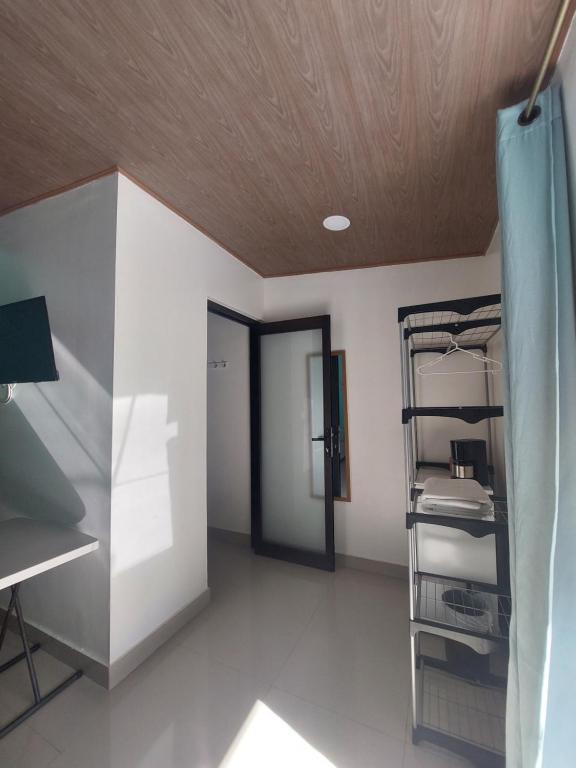 Postel nebo postele na pokoji v ubytování Hotel Carlota Tamarindo