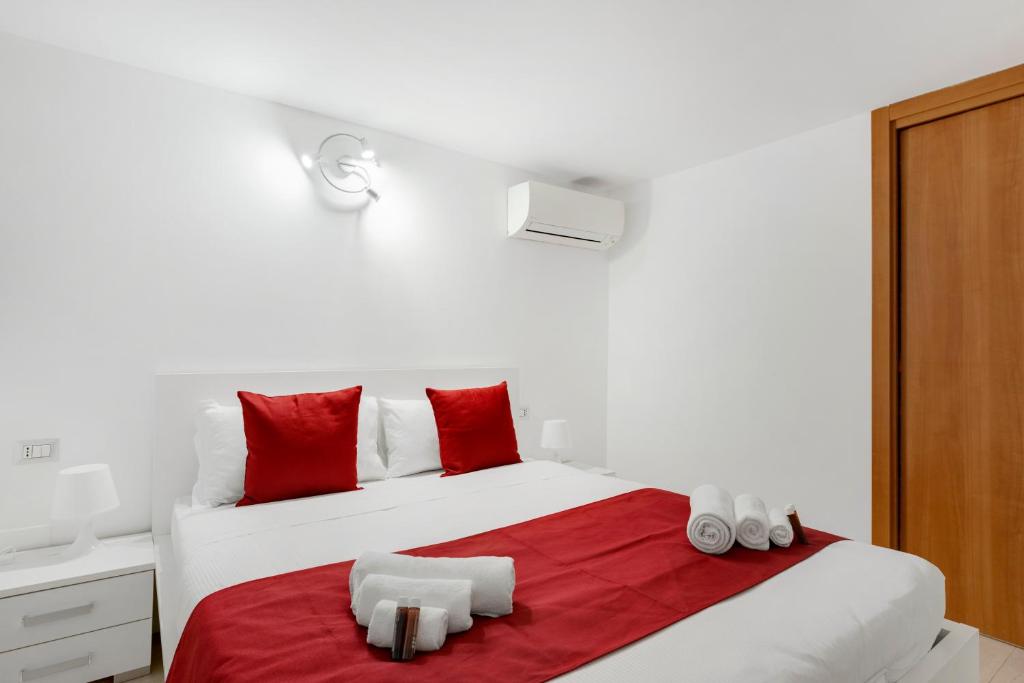 Un pat sau paturi într-o cameră la 10 minuti Metro Duomo con Parcheggi Privati