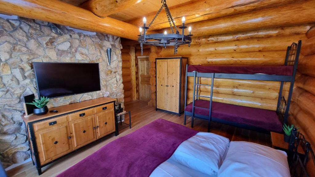 Postel nebo postele na pokoji v ubytování Penzion Srub Panorama
