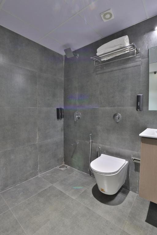 Koupelna v ubytování Hotel Shivashish