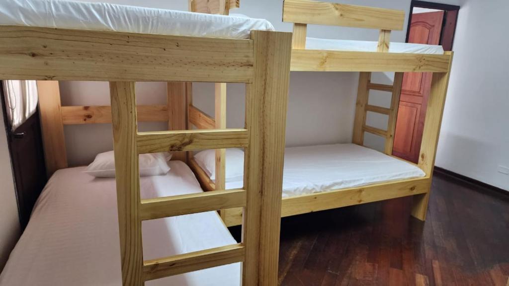 Postel nebo postele na pokoji v ubytování Paisa Hostel Medellín