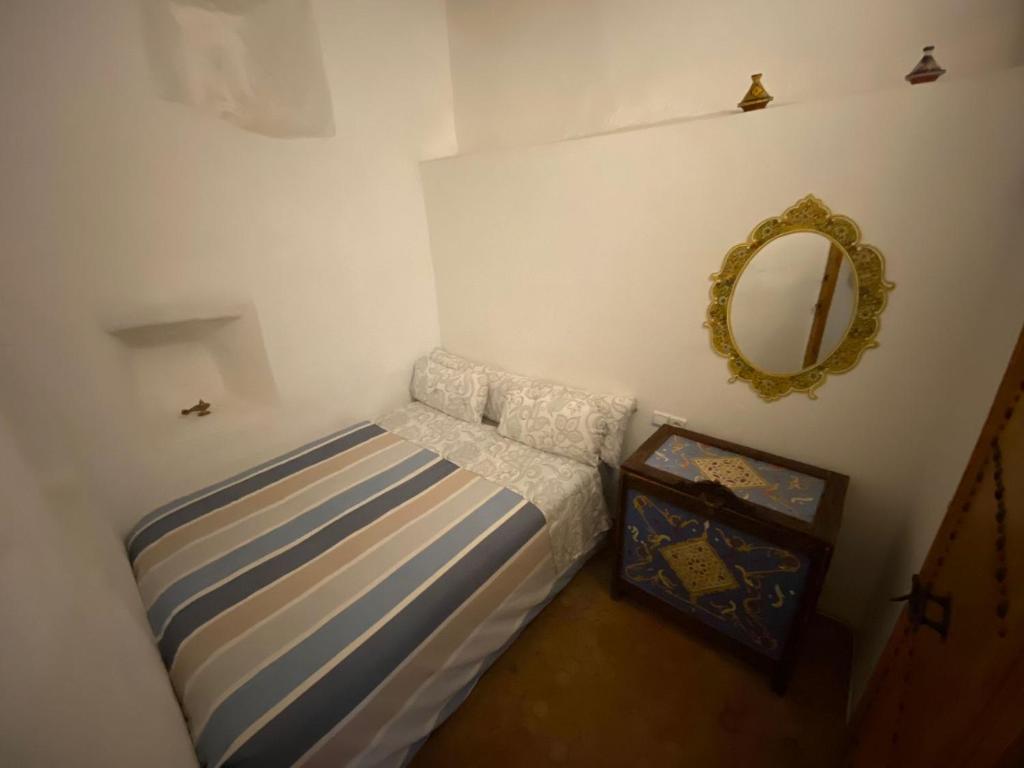 Uma cama ou camas num quarto em Dar Tetuania