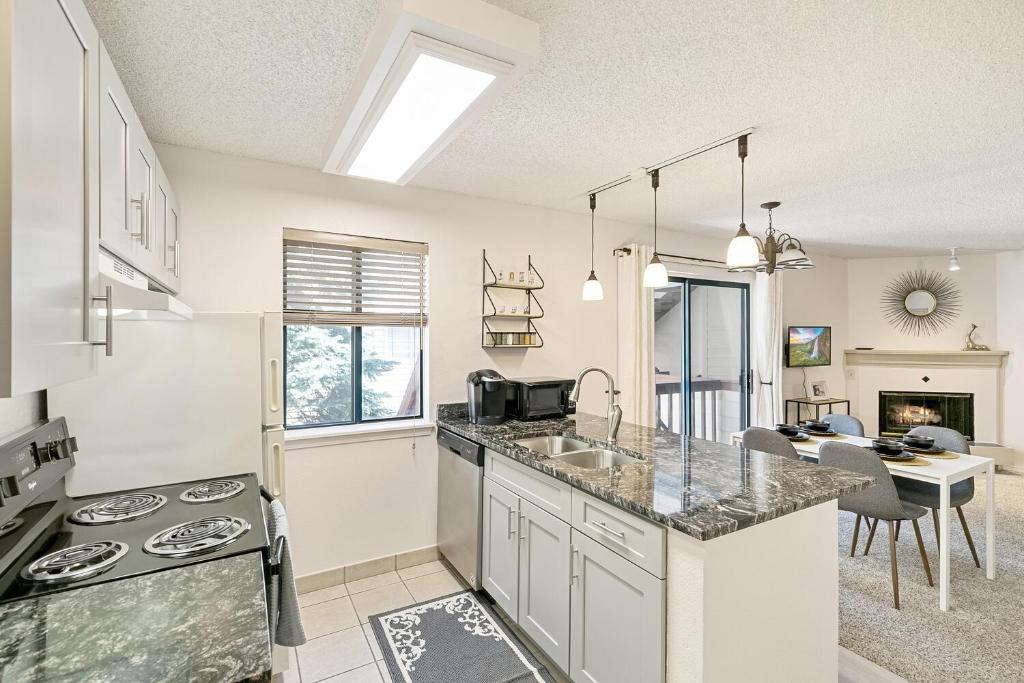 a kitchen with a sink and a counter top at Boston Commons - 1263 in Greenwood Village