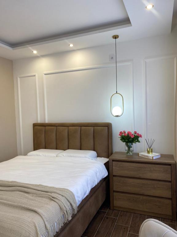 Giường trong phòng chung tại Magic Luxury