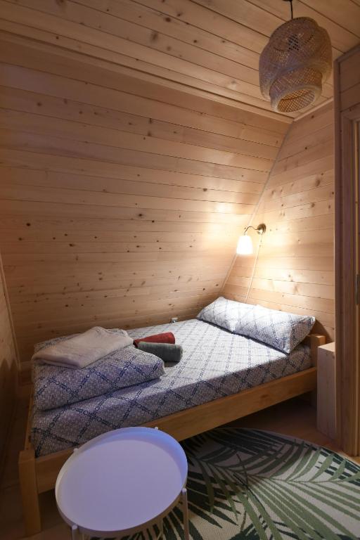 Postel nebo postele na pokoji v ubytování Koliba Vuk