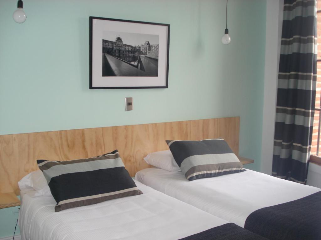 Postel nebo postele na pokoji v ubytování Hotel Ultramar