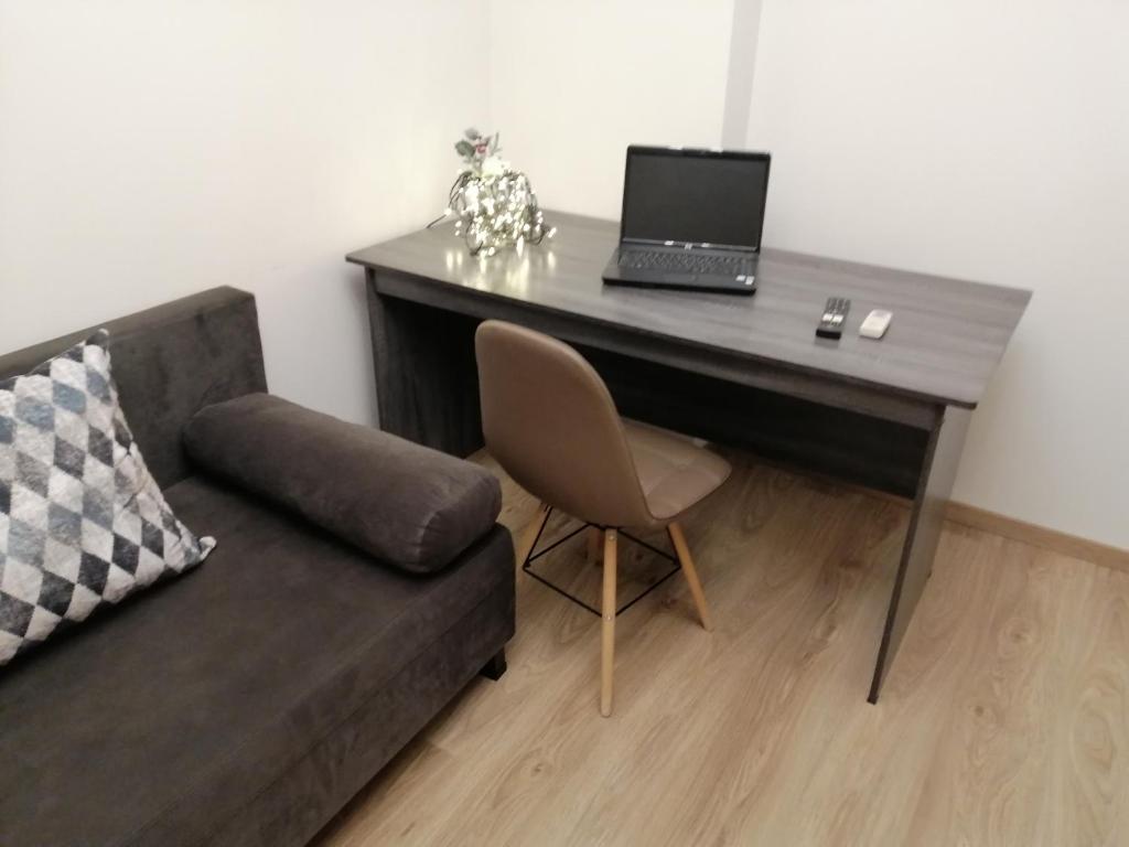 TV a/nebo společenská místnost v ubytování Central suite on Clock Square D1