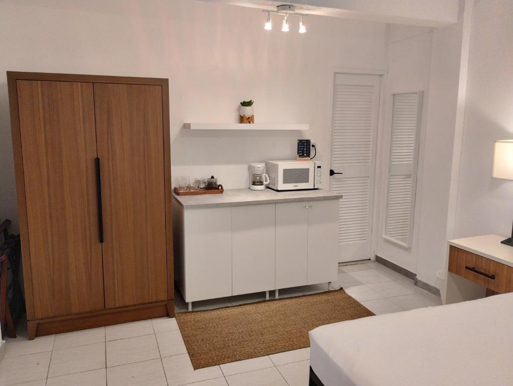 Kuchyň nebo kuchyňský kout v ubytování Trinitaria House Hotel