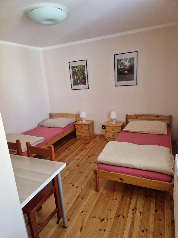 Postel nebo postele na pokoji v ubytování Penzion Kornout