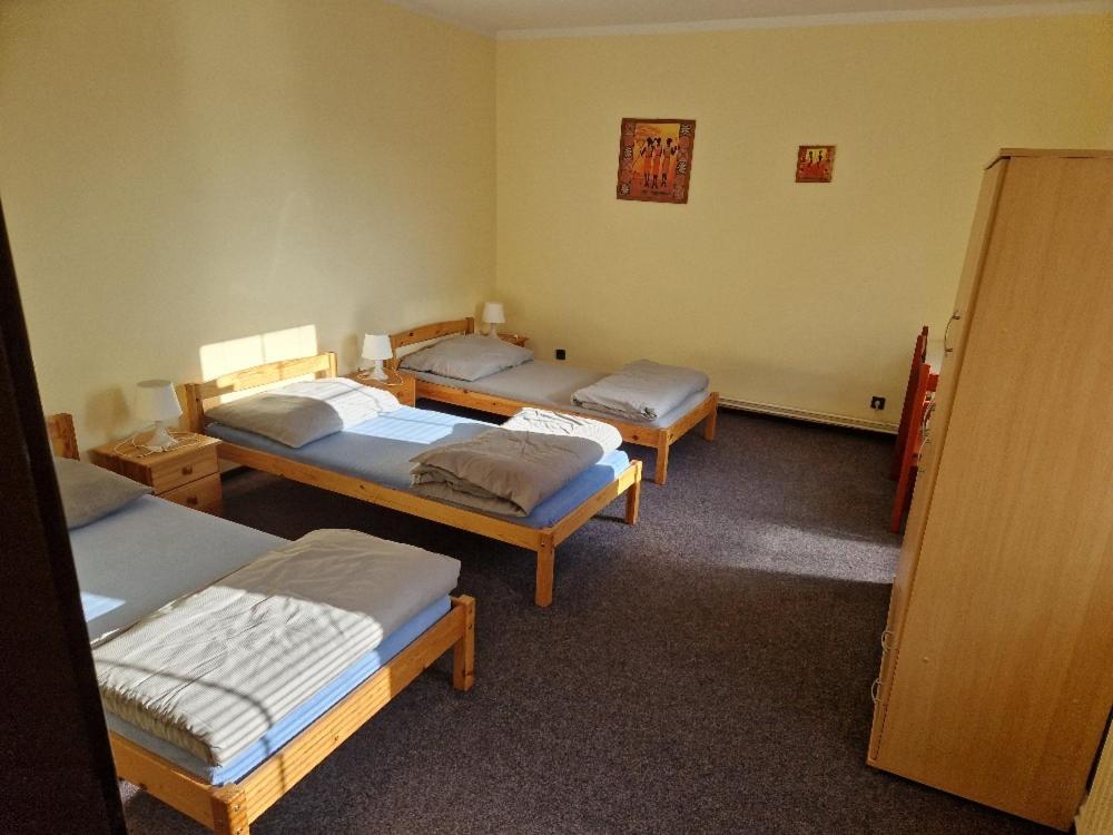 Postel nebo postele na pokoji v ubytování Penzion Kornout