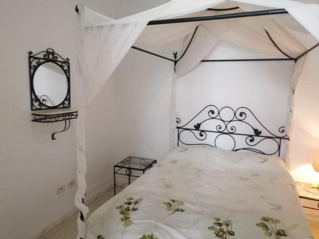 Postel nebo postele na pokoji v ubytování JARDIN Apartments