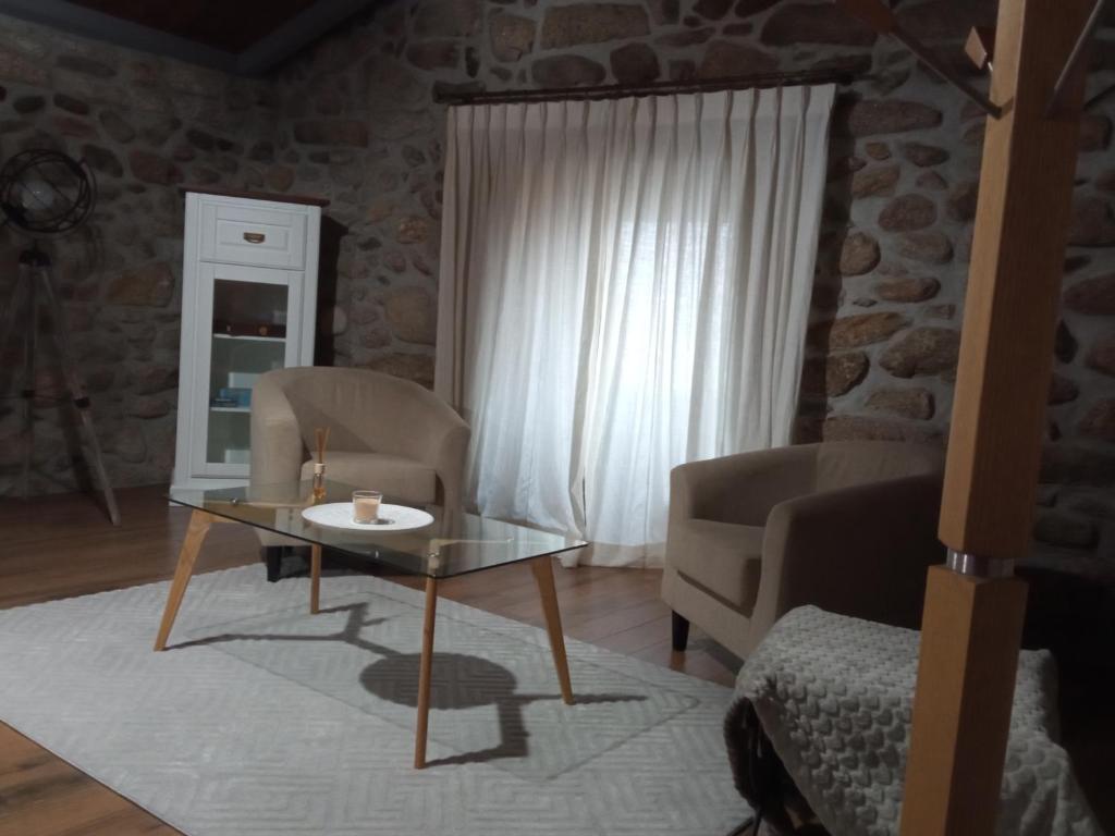 Uma área de estar em Casa Tia Vina - Serra