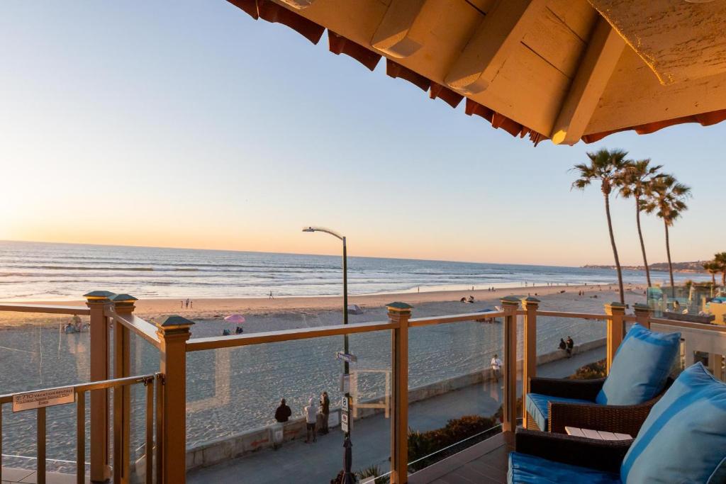 a view from the balcony of the beach at Oceanfront, two-level condo with stunning view, decks, fast WiFi & fireplace in San Diego