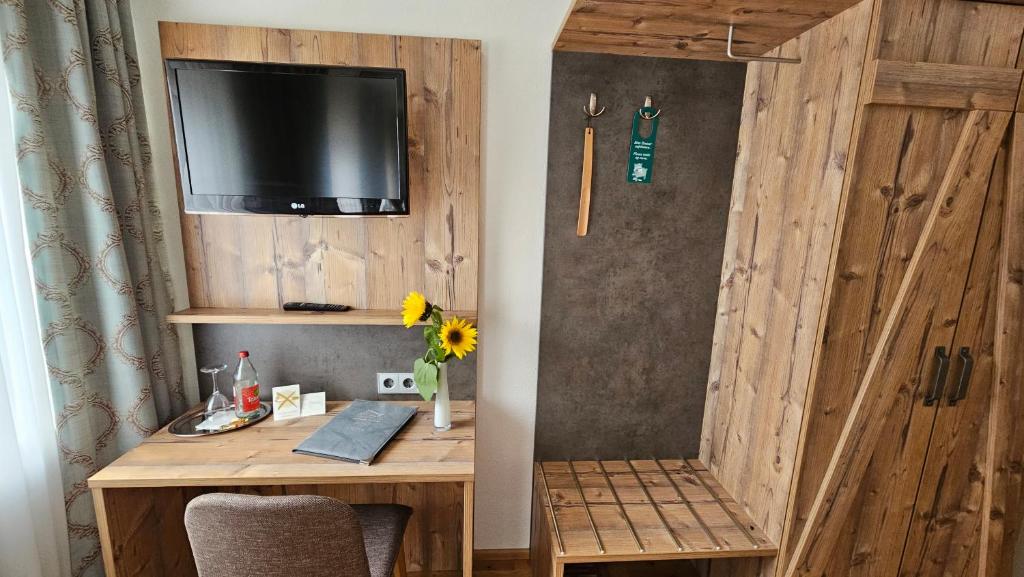 TV a/nebo společenská místnost v ubytování Hotel Gasthof Rössle