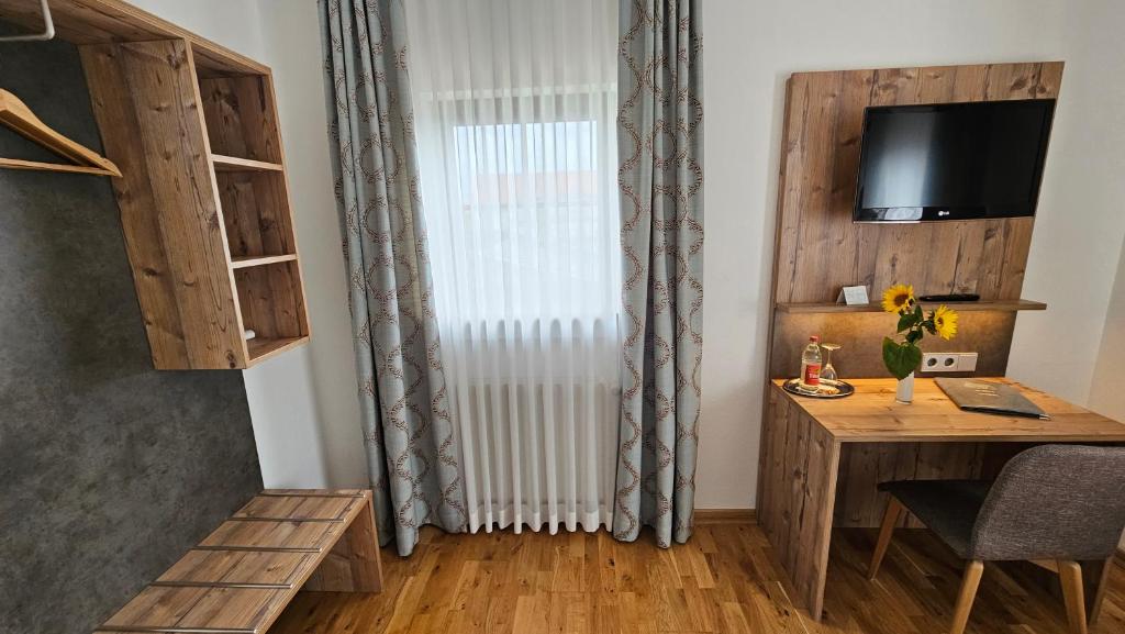 TV a/nebo společenská místnost v ubytování Hotel Gasthof Rössle