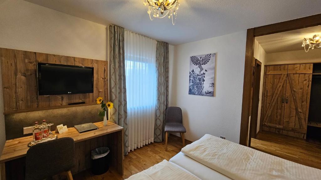 TV a/nebo společenská místnost v ubytování Hotel Gasthof Rössle