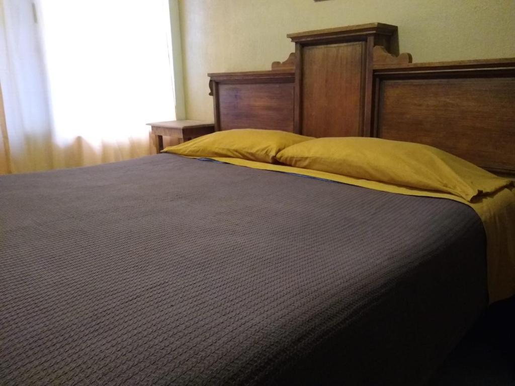 Postel nebo postele na pokoji v ubytování Posada Lindavista