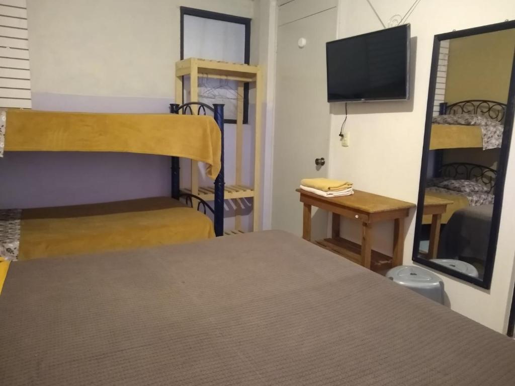 Postel nebo postele na pokoji v ubytování Posada Lindavista