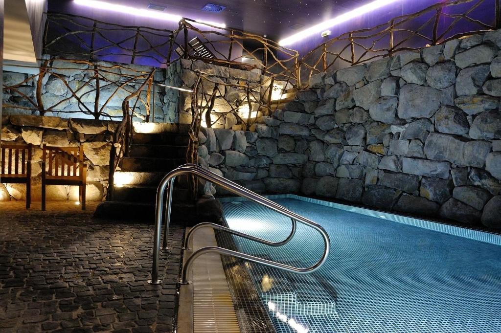 Bazén v ubytování Enotel Lido - All Inclusive nebo v jeho okolí