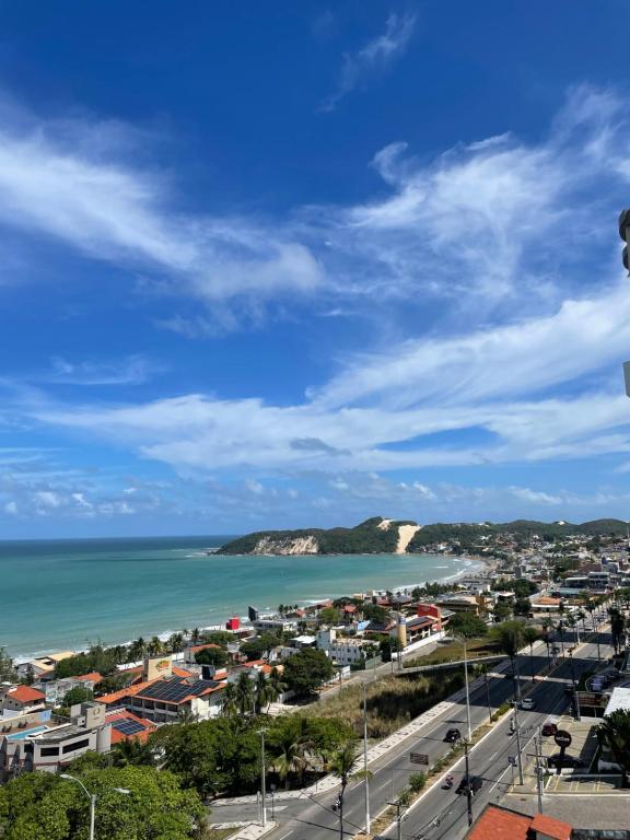 - Vistas a la ciudad y al océano en Flat com vista para o mar - Ponta Negra, en Natal