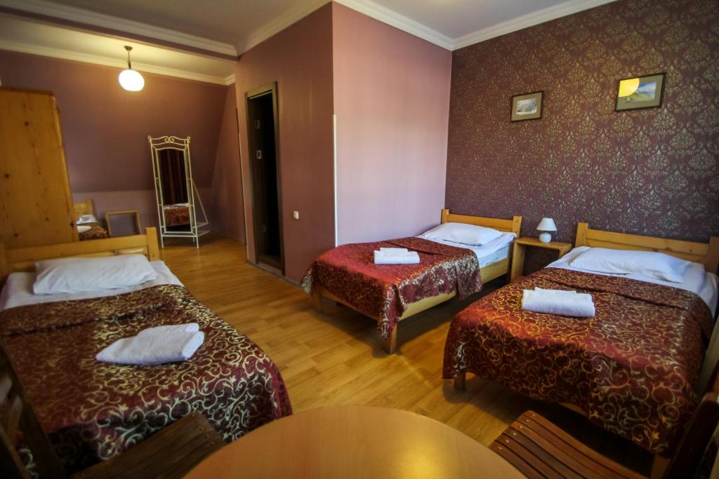 Postel nebo postele na pokoji v ubytování Hotel Svaneti