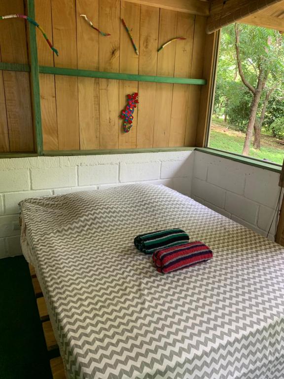 Postel nebo postele na pokoji v ubytování Cabañas Casa Soley