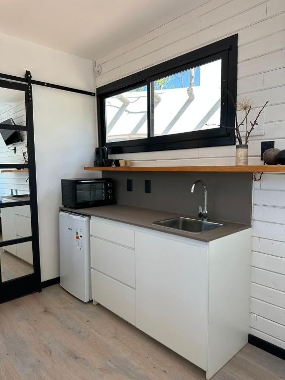 Kuchyň nebo kuchyňský kout v ubytování tiny house entre viñedos