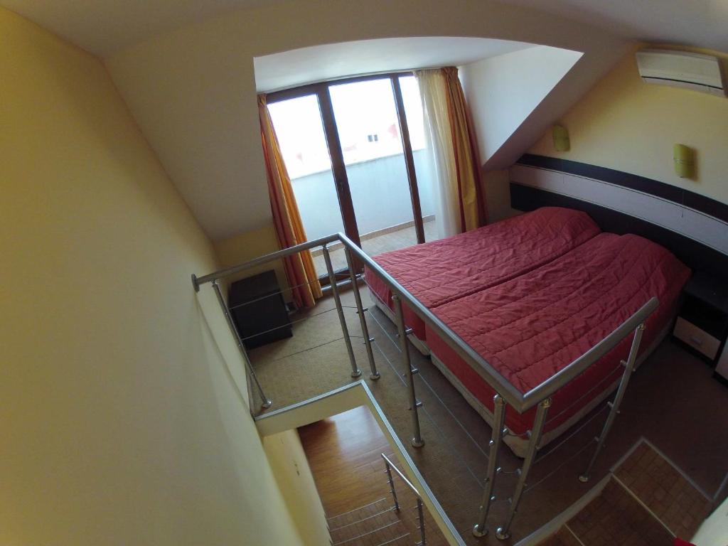 Postel nebo postele na pokoji v ubytování Hotel Apolis