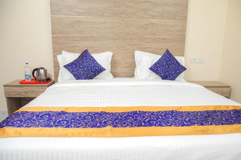 Postel nebo postele na pokoji v ubytování RedFox Hotel-T.Nagar