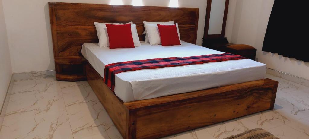 Postel nebo postele na pokoji v ubytování Ayubowan Holiday Home