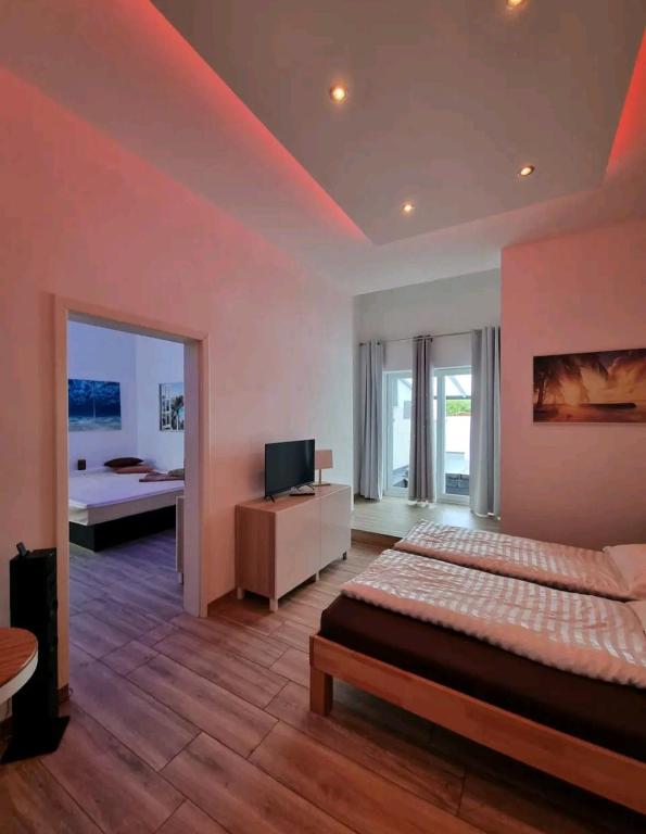 Apartment mit Whirlpool, Wasserbett & Sauna - Appartement Met één Slaapkamer