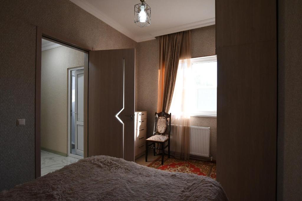 Postel nebo postele na pokoji v ubytování Nika house