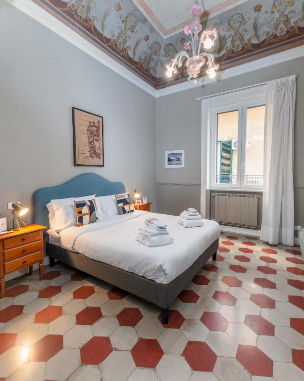 A bed or beds in a room at casa mo room and suite
