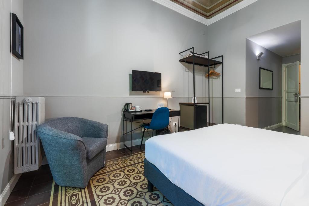 A television and/or entertainment centre at casa mo room and suite
