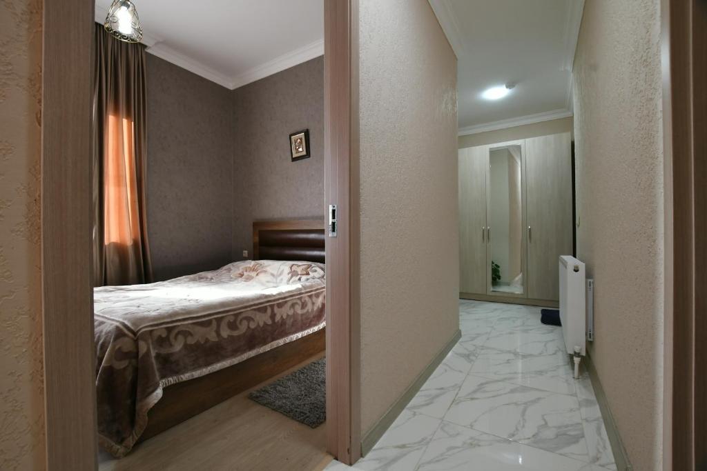 Postel nebo postele na pokoji v ubytování Nika house