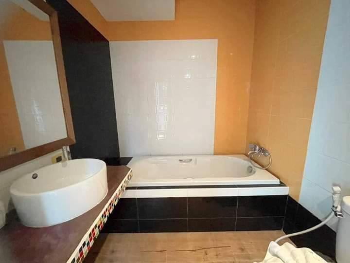 Koupelna v ubytování Jingjit Hotel