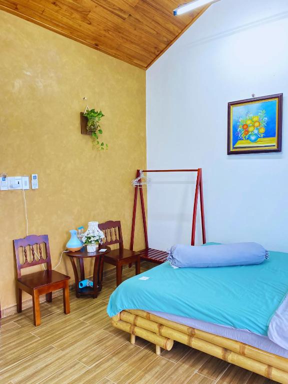 Postel nebo postele na pokoji v ubytování Tâm Family Homestay-Huế
